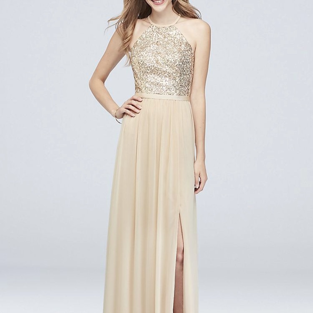 NEW GOLD a sequined, high-neck halter, open back, and mesh skirt create a glam